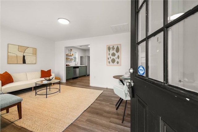 living room featuring dark wood-type flooring