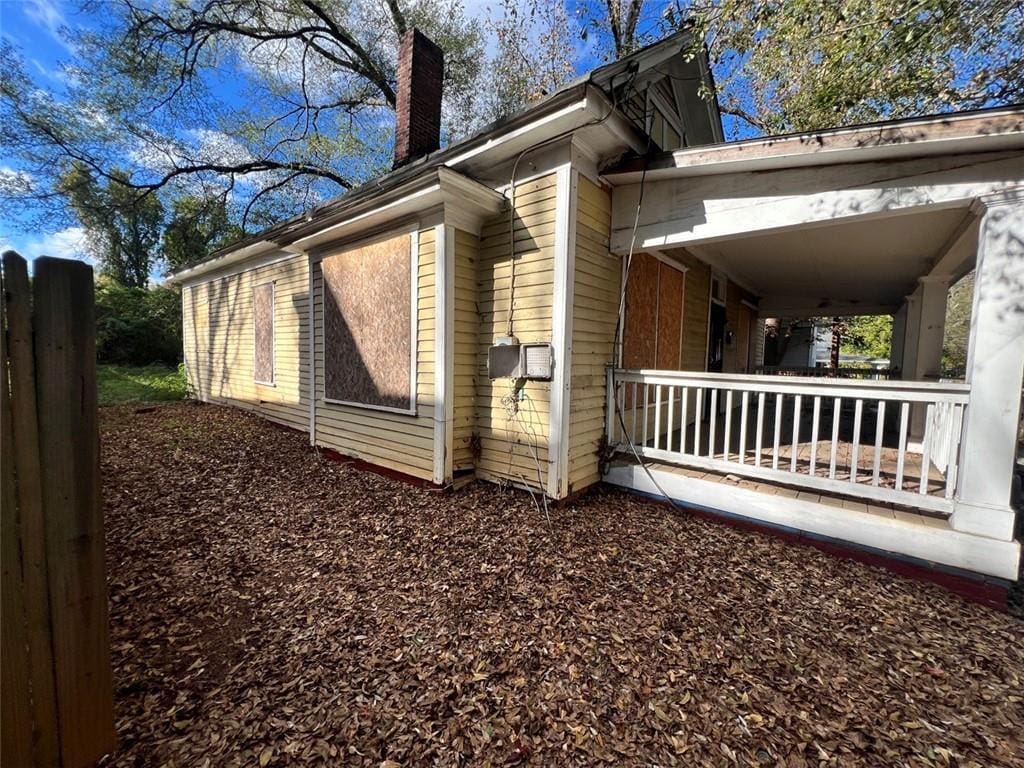 view of home's exterior with a porch