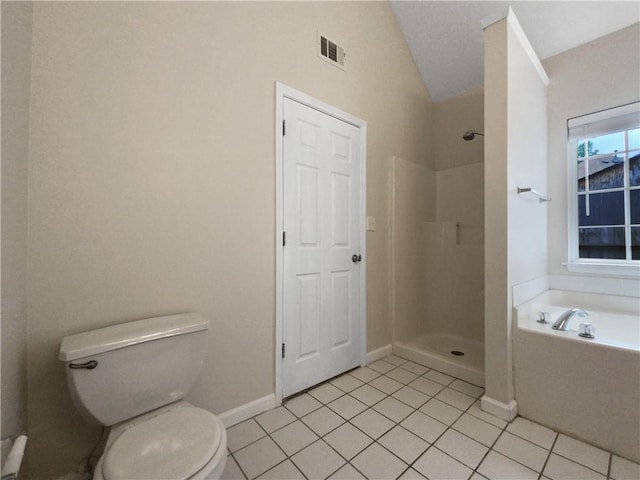 bathroom featuring plus walk in shower, tile patterned floors, lofted ceiling, and toilet