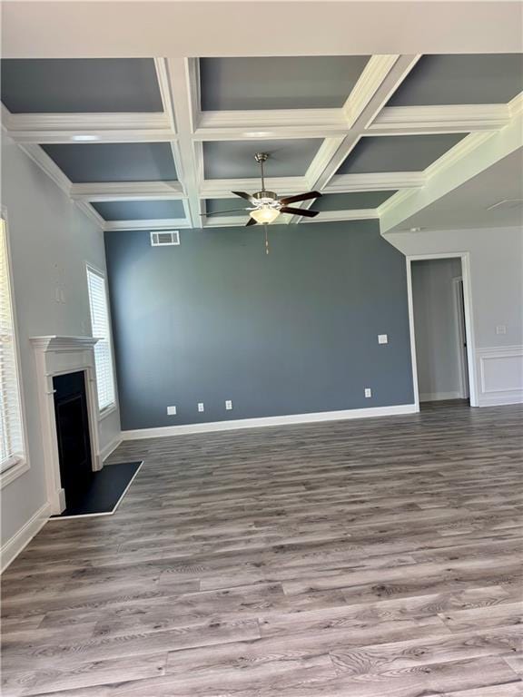 4416 Birch Meadow Trl, Gainesville, GA 30504 - unfurnished living room featuring a ceiling fan, coffered ceiling, wood finished floors, a fireplace, and beam ceiling