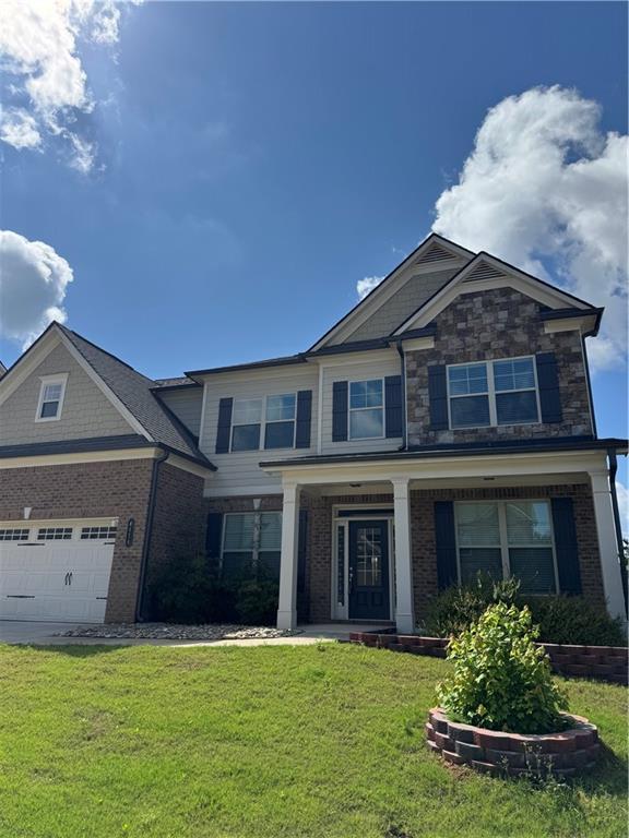 4416 Birch Meadow Trl, Gainesville, GA 30504 - craftsman-style house with brick siding and a front yard