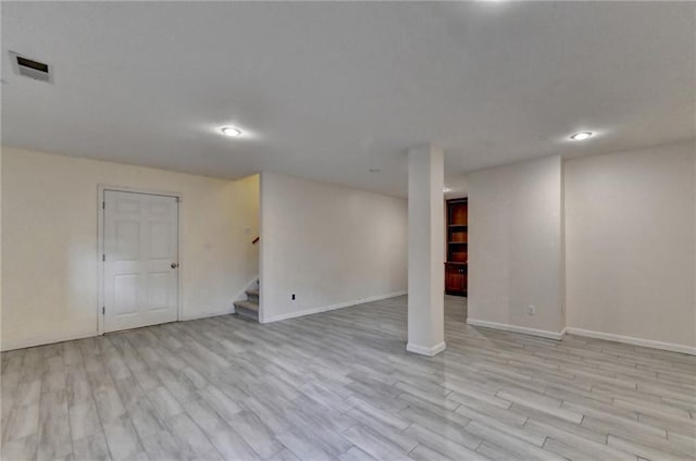 basement featuring light wood-type flooring