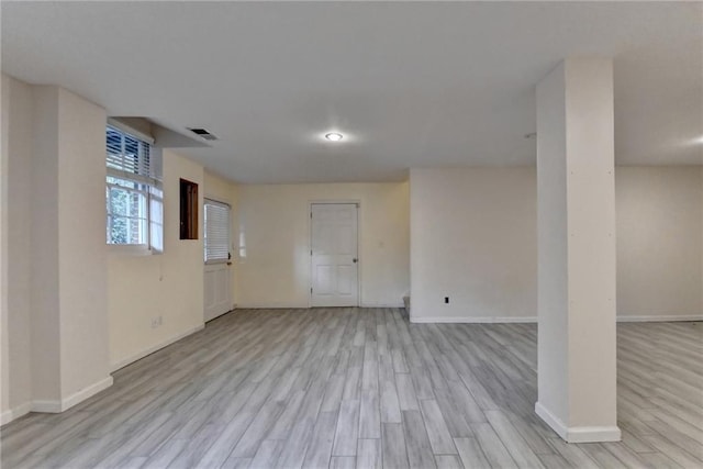 basement featuring light hardwood / wood-style flooring