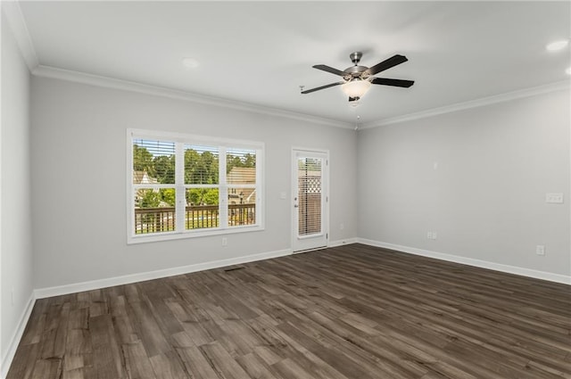 unfurnished room featuring ceiling fan, crown molding, and dark hardwood / wood-style floors