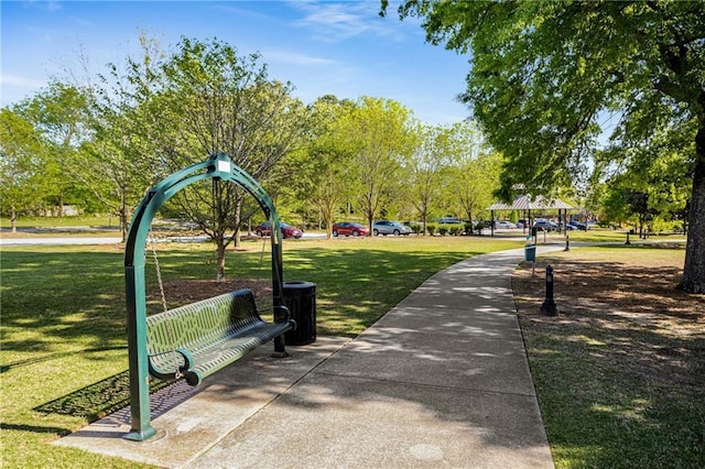 view of community featuring a gazebo and a lawn