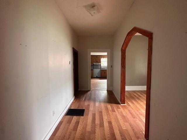 29 Ivy St, Porterdale, GA 30014 - corridor featuring light wood finished floors and baseboards