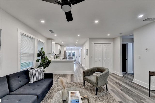 538 Center Hill Ave NW, Atlanta, GA 30318 - living room with recessed lighting, visible vents, light wood-type flooring, and a ceiling fan
