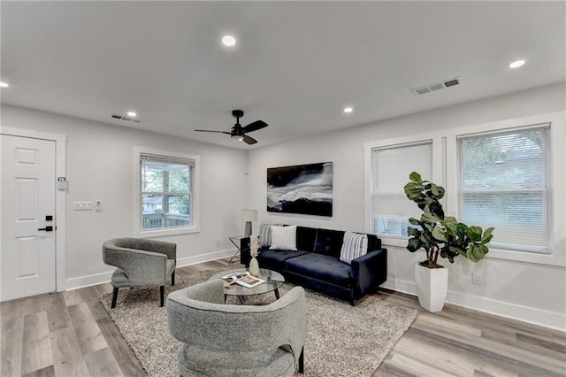 538 Center Hill Ave NW, Atlanta, GA 30318 - living room featuring light wood finished floors, visible vents, and baseboards