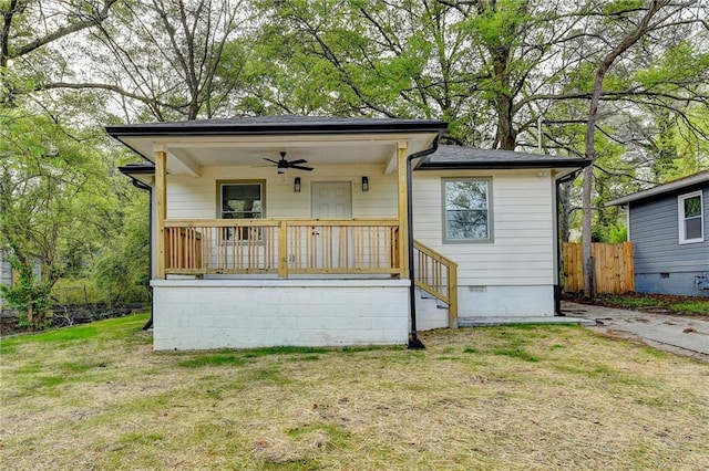 538 Center Hill Ave NW, Atlanta, GA 30318 - bungalow-style house with a front yard, a porch, a ceiling fan, crawl space, and fence