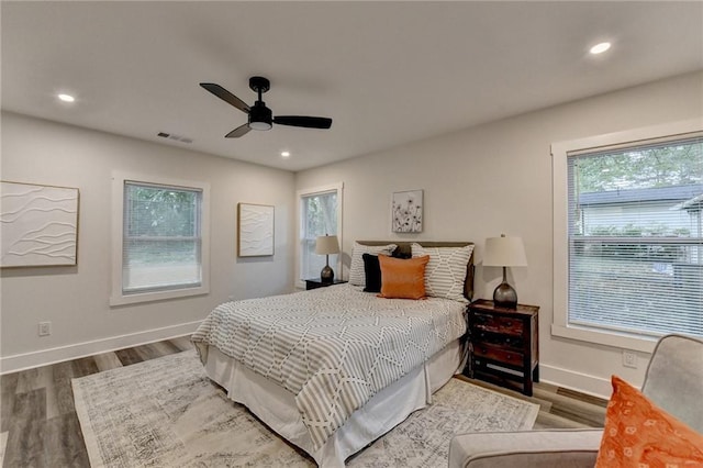 538 Center Hill Ave NW, Atlanta, GA 30318 - bedroom featuring visible vents, multiple windows, and wood finished floors