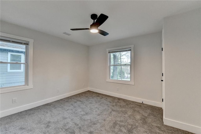 538 Center Hill Ave NW, Atlanta, GA 30318 - empty room with carpet flooring, visible vents, baseboards, and a ceiling fan