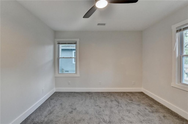 538 Center Hill Ave NW, Atlanta, GA 30318 - empty room featuring visible vents, ceiling fan, carpet floors, and baseboards