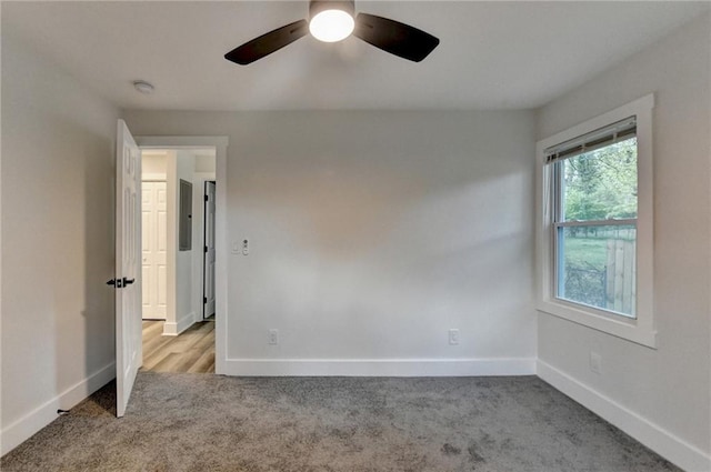 538 Center Hill Ave NW, Atlanta, GA 30318 - unfurnished bedroom featuring ceiling fan, carpet flooring, and baseboards