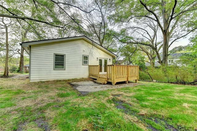 538 Center Hill Ave NW, Atlanta, GA 30318 - back of house featuring french doors, a wooden deck, and a lawn