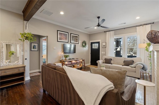 living room with dark hardwood / wood-style flooring, crown molding, beamed ceiling, and ceiling fan