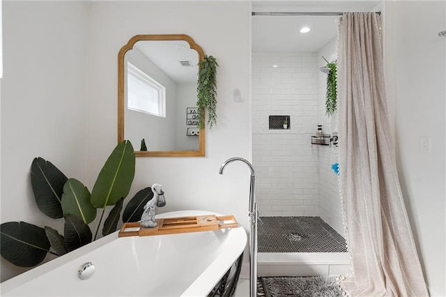 bathroom featuring curtained shower