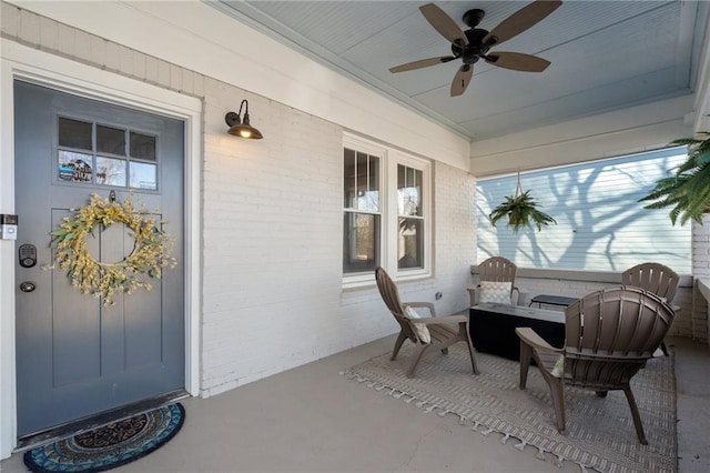 exterior space with ceiling fan