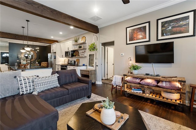 living room featuring beamed ceiling, ornamental molding, dark wood-type flooring, and a notable chandelier