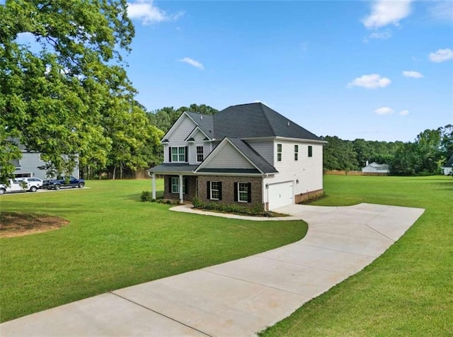 view of front of property featuring a garage and a front yard