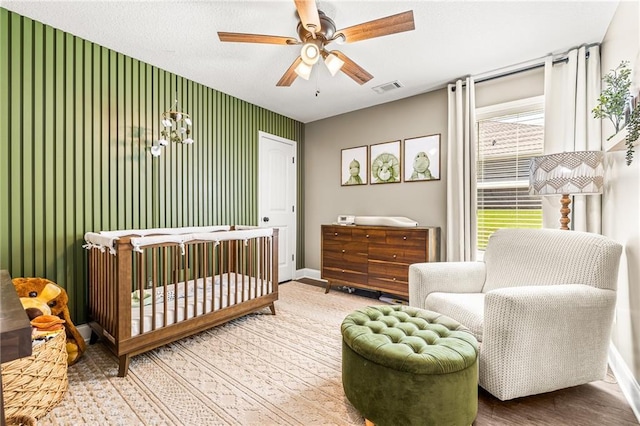 137 Evergreen Ridge Ct, Statham, GA 30666 - bedroom with baseboards, wood finished floors, and ceiling fan