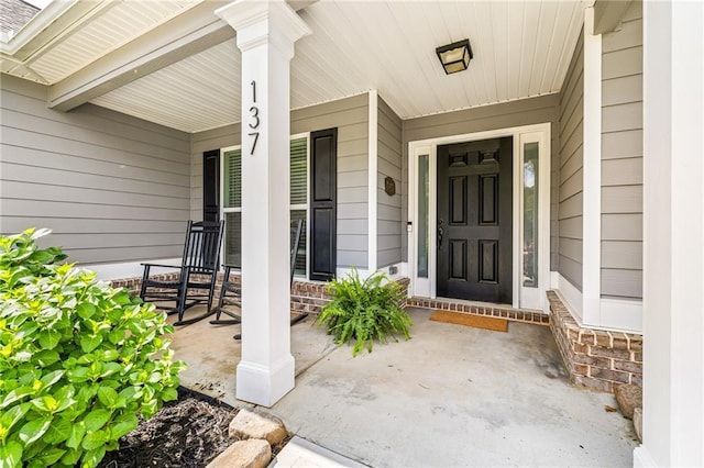 137 Evergreen Ridge Ct, Statham, GA 30666 - entrance to property with a porch