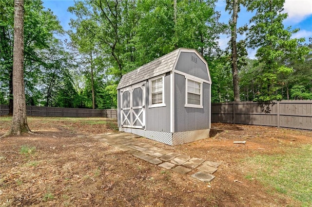 137 Evergreen Ridge Ct, Statham, GA 30666 - view of shed with a fenced backyard and view of wooded area