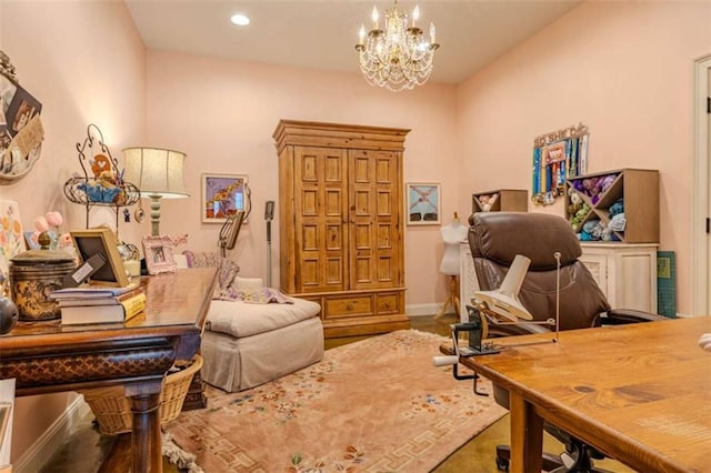 home office featuring an inviting chandelier