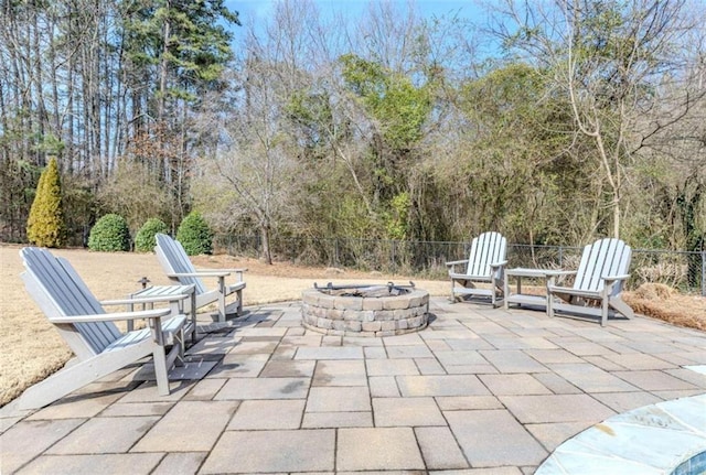 view of patio with a fire pit