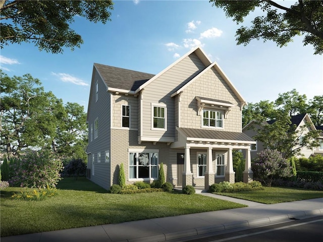 craftsman house with brick siding and a front yard