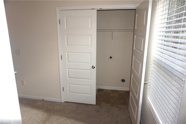 laundry room with carpet, laundry area, hookup for an electric dryer, and baseboards