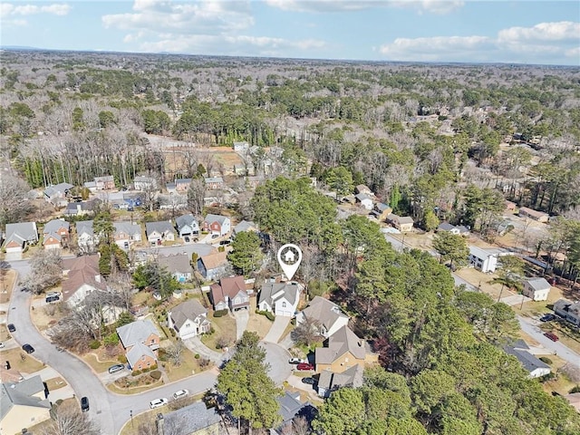 birds eye view of property with a residential view