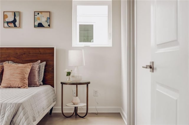 bedroom featuring hardwood / wood-style floors