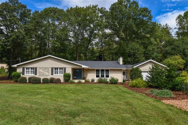 ranch-style house featuring a front lawn