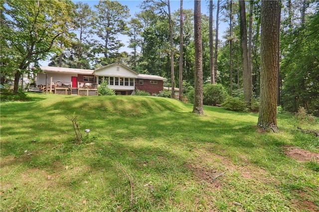 view of yard featuring a deck