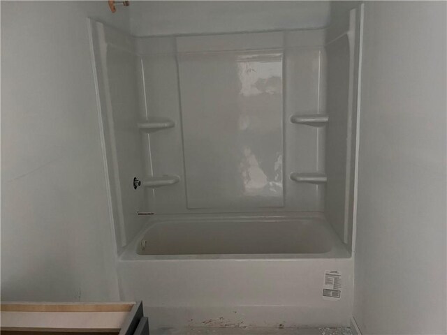 bathroom with bathtub / shower combination and vanity