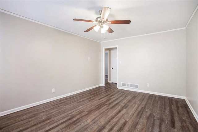 spare room with dark hardwood / wood-style flooring, ceiling fan, and crown molding