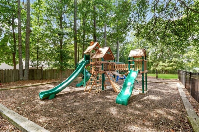 communal playground featuring fence