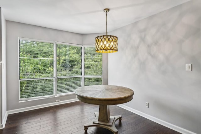 244 13th St NE Unit 302, Atlanta, GA 30309 - dining area with baseboards and wood-type flooring