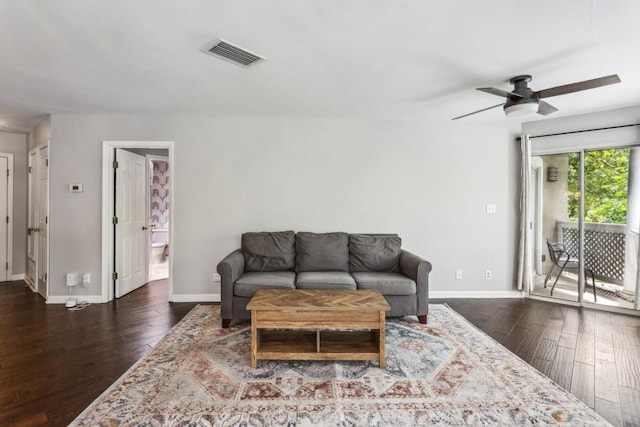 244 13th St NE Unit 302, Atlanta, GA 30309 - living area featuring dark wood finished floors and ceiling fan