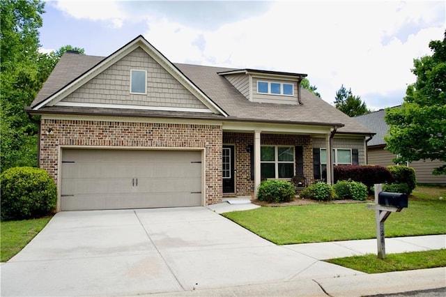 craftsman-style home featuring driveway, brick siding, a front lawn, and an attached garage