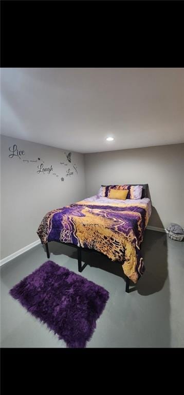 bedroom with concrete flooring