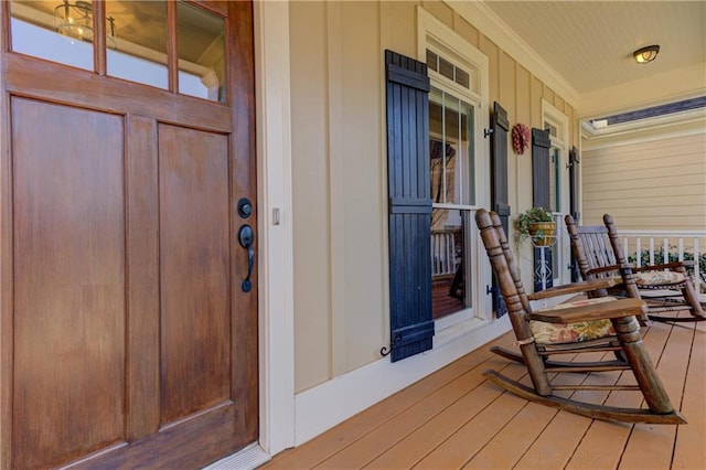 doorway to property with covered porch