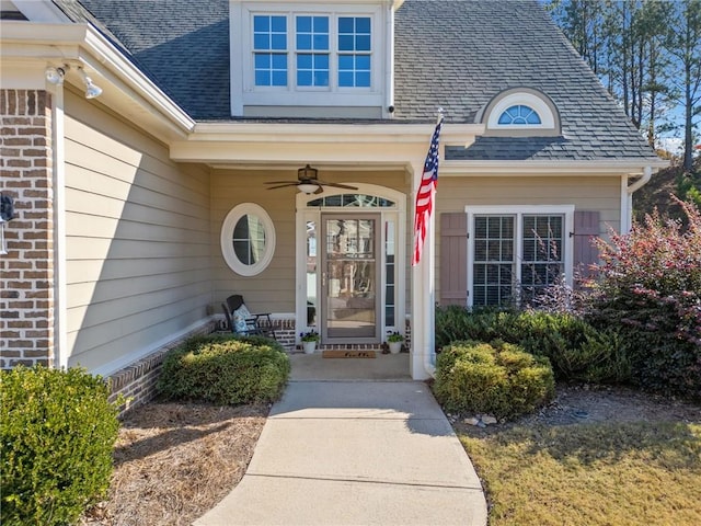 property entrance with ceiling fan