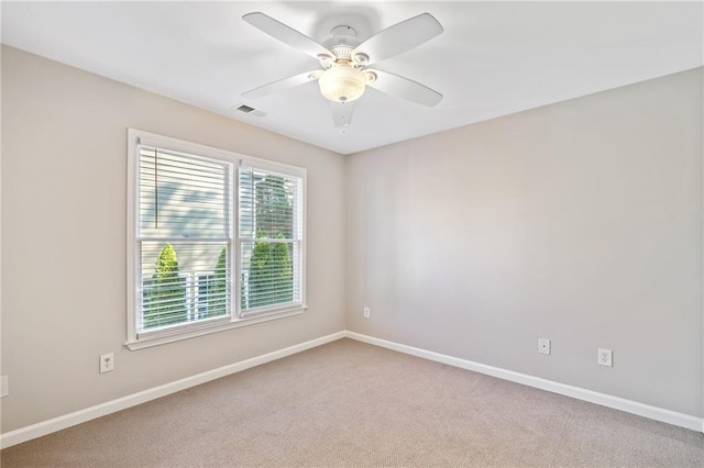 bedroom with ceiling fan and light carpet