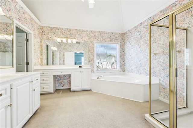 full bathroom featuring lofted ceiling, vanity, a bath, a stall shower, and wallpapered walls