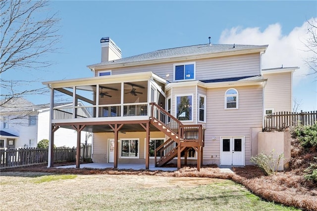 back of property featuring ceiling fan, a patio, fence, a sunroom, and stairway