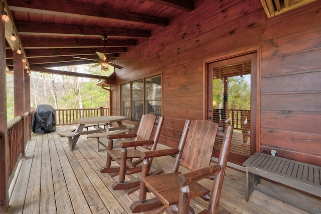 wooden deck with area for grilling