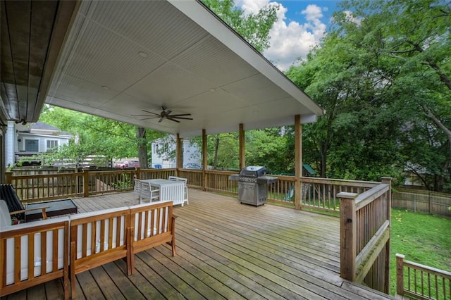 deck featuring a grill and ceiling fan