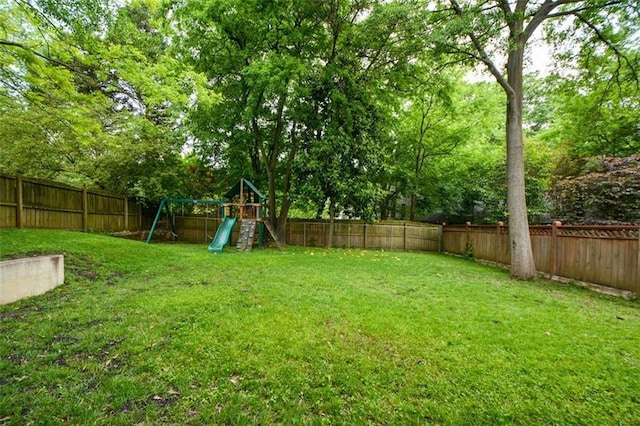 view of yard with a playground