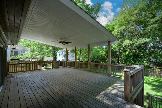 wooden terrace featuring ceiling fan